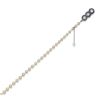 Lot 163 - A Cultured Pearl Necklace, the graduated pearls knotted to a sapphire and diamond clasp, the...