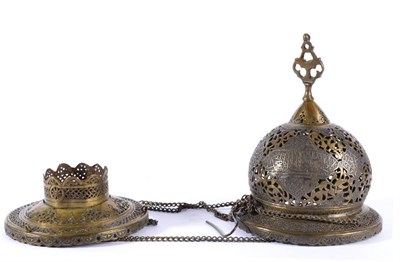 Lot 74 - A Persian White Metal Inlaid Brass Censer, 19th century, of semi-ovoid form, decorated with...