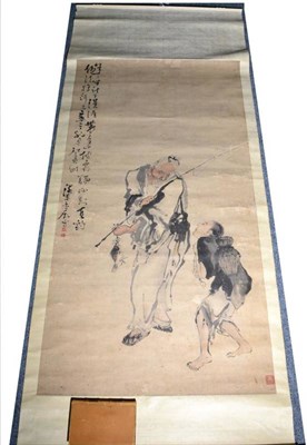 Lot 75 - A Chinese Scroll Painting, depicting a fisherman and attendants and with calligraphy, seal...
