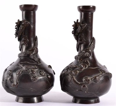 Lot 94 - A Pair of Japanese Bronze Bottle Vases, Meiji period, cast with scrolling dragons, 16cm high