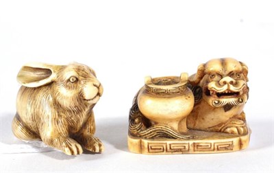 Lot 95 - A Japanese Ivory Netsuke, Meiji period, carved as a crouching rabbit, signed, 4cm long; and...