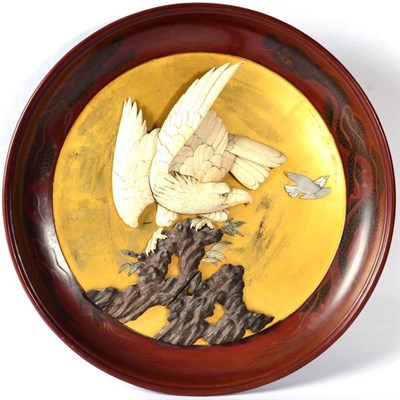 Lot 108 - A Japanese Lacquer and Shibayama Plaque, Meiji period, as an eagle on an outcrop on a dished...