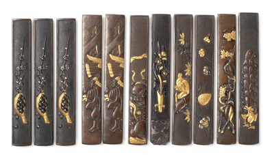 Lot 109 - A Collection of Eleven Japanese Bronze and Inlaid Kozuka (Knife Handles), 19th century,...