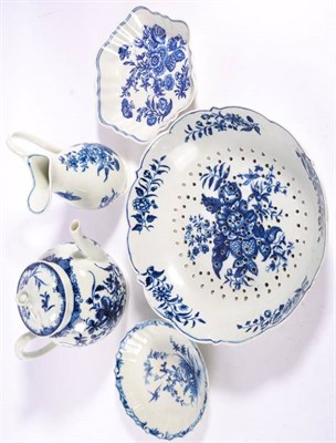 Lot 115 - A Worcester Porcelain Teapot and Cover, circa 1770, painted in underglaze blue with the...