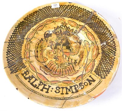 Lot 121 - A Slipware Charger, in 17th century style, trailed in coloured slips with a portrait of King...