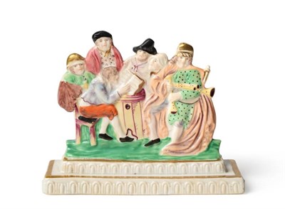 Lot 135 - A Dillwyn & Co Swansea Porcelain Flatback Group, circa 1815, as figures about a table on a...