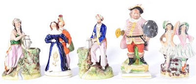 Lot 185 - A Pearlware Figure of Falstaff, early 19th century, after the Derby original, standing on a...