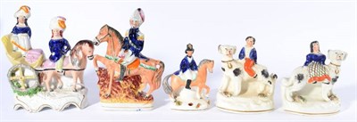 Lot 189 - A Pair of Staffordshire Porcellaneous Figures of the Royal Children, mid 19th century, each sitting