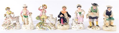 Lot 197 - A Pair of Staffordshire Porcellaneous Figures of Gardeners, mid 19th century, he with a spade,...