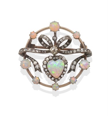 Lot 204 - An Opal and Diamond Brooch, circa 1890, a bow and heart motif with old cut diamonds set throughout