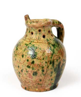 Lot 205 - A Dated Donyatt Slipware Puzzle Jug, 1829, of bellied form, inscribed FILL ME FOOL OF GOOD BEAR AND