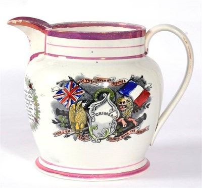 Lot 210 - A Sunderland Lustre Crimea Commemorative Jug, mid 19th century, printed and overpainted with flags