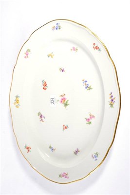 Lot 224 - A Meissen Porcelain Oval Platter, circa 1900, painted in colours with scattered flowersprigs within