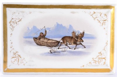 Lot 228 - A Russian Porcelain Paperweight, circa 1860, of rectangular form, painted with an elk pulling...