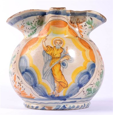 Lot 235 - An Italian Maiolica Ewer, 17th century, of ovoid form with pinched spout, painted in colours...