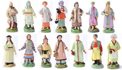 Lot 237 - A Set of Fourteen Russian Porcelain Figures, late 19th century, depicting peasants in various...