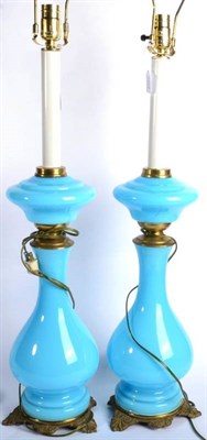 Lot 257 - A Pair of French Gilt Metal Mounted Blue Glass Lamp Bases, late 19th century, of baluster form...