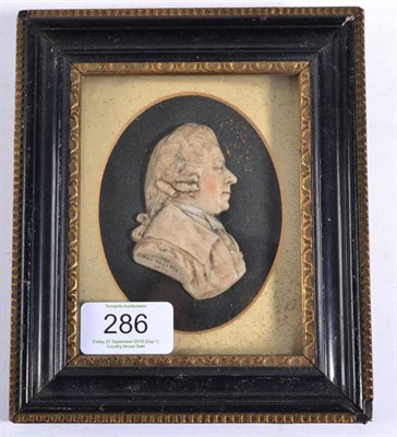 Lot 286 - James Beattie: A Wax Relief Bust Portrait of a Gentleman, dated 1787, his hair en queue,...