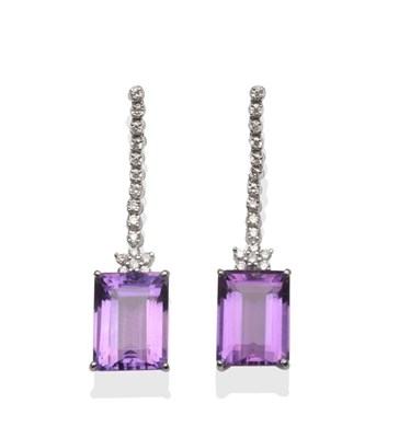 Lot 238 - A Pair of 18 Carat White Gold Diamond and Amethyst Drop Earrings, a row of round brilliant cut...