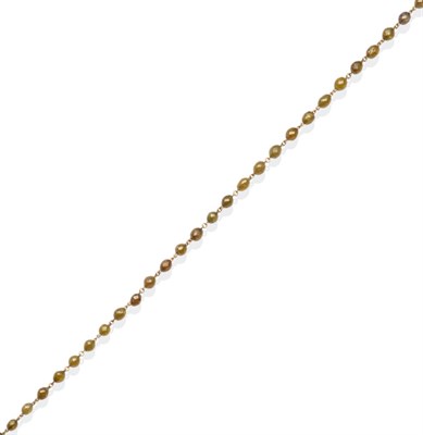 Lot 240 - A Diamond Necklace, of chain linked briolette diamonds, in champagne to cognac colours, length 62cm