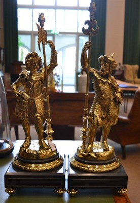 Lot 379 - A Pair of Gilt Brass Figural Lamp Bases, 20th century, modelled as a Renaissance soldier and a...