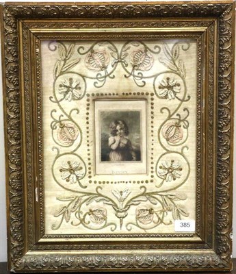 Lot 385 - An Early 19th Century Coloured Mezzotint, ''Infancy'', within a cream silk mount embroidered...