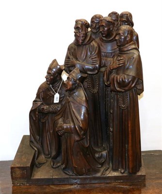 Lot 387 - A Carved Wood Figure Group, in 16th century style, depicting two kneeling bishops and six attendant