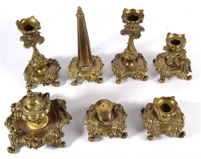 Lot 390 - A Brass Desk Set, late 19th century, in rococo style, comprising an inkwell and cover, a...