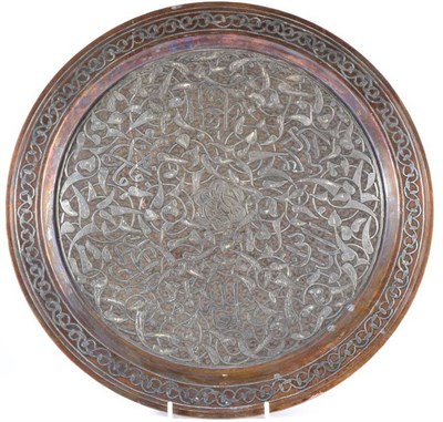 Lot 396 - A Persian White Metal Inlaid Copper Alloy Tray, 19th century, with scrolling foliate...