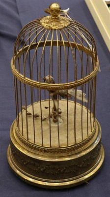 Lot 403 - A Clockwork Birdcage Automata, 20th century, of domed form, with bird on a perch, on a circular...