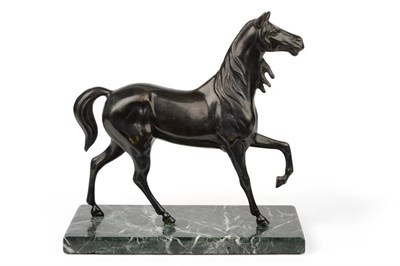 Lot 404 - French School, late 19th century: A Bronze Figure of a Standing Horse, its foreleg raised, 27cm...