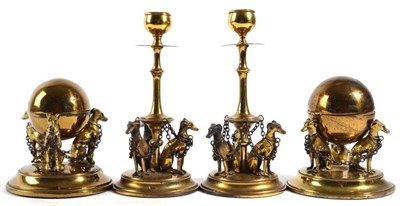 Lot 418 - A Lacquered Brass Desk Set, early 20th century, comprising a pair of candlesticks, an inkwell and a