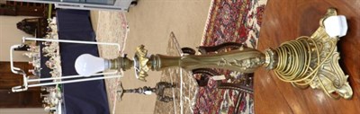 Lot 427 - A Gilt Metal Lamp Base, late 19th century, of leaf and scroll cast baluster form, on a tricorn...