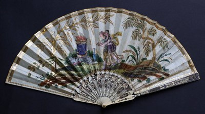 Lot 439 - A Regency Ivory Fan, circa 1810-20, with silvering and gilding, carving and piercing to the...