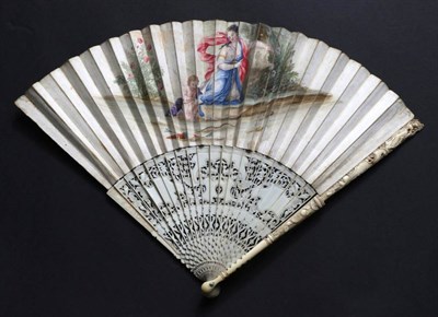 Lot 466 - An Early 18th Century Carved and Pierced Ivory Fan, with slender sticks, each guard carved with...