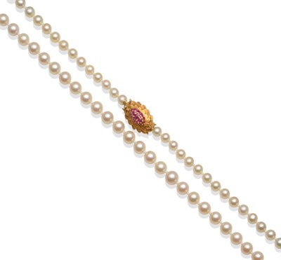 Lot 302 - A Cultured Pearl Necklace, the graduated pearls knotted to an 18 carat gold clasp, set with...