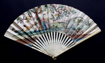 Lot 486 - An Early 18th Century Printed and Hand-Coloured Fan, the bone monture carved quite lightly, the...