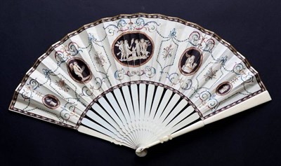 Lot 488 - An 18th Century Ivory Fan, with cream vellum leaf, mounted … l'Anglaise, the monture quite...