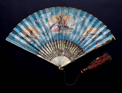 Lot 490 - An 18th Century Ivory Fan, the slender sticks heavily gilded and silvered, the gorge with three...