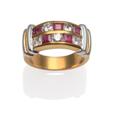 Lot 305 - ~ A Ruby and Diamond Ring, two rows of alternating step cut rubies and round brilliant cut...