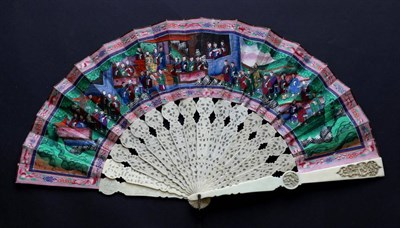 Lot 523 - A 19th Century Ivory Mandarin Fan, Qing Dynasty, the gorge sticks lightly carved, the guards carved