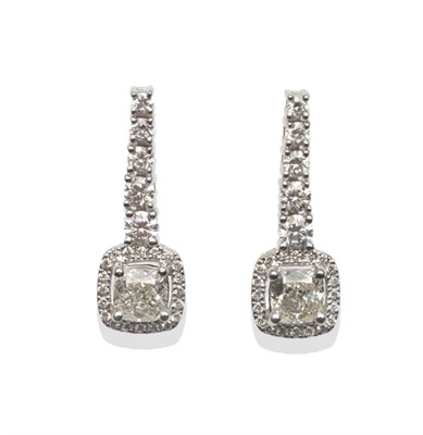 Lot 313 - A Pair of Diamond Drop Earrings, a graduated row of five round brilliant cut diamonds suspends...