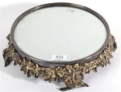 Lot 533 - An Electroplated Mirror Plateau or Cake Stand, 19th century, circular and decorated with oak leaves