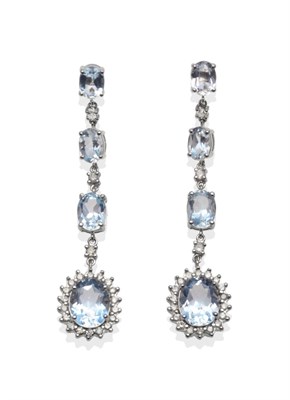 Lot 317 - A Pair of Aquamarine and Diamond Earrings, three oval cut aquamarines alternate with round...