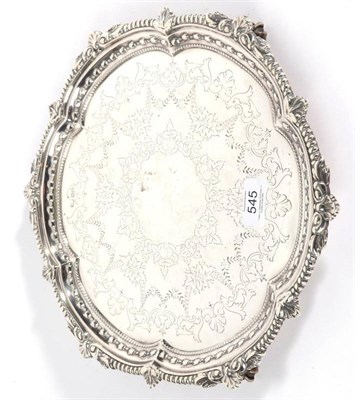 Lot 545 - A Victorian Silver Salver, Atkin Bros., Sheffield 1897, shaped circular with bell flower, bead...