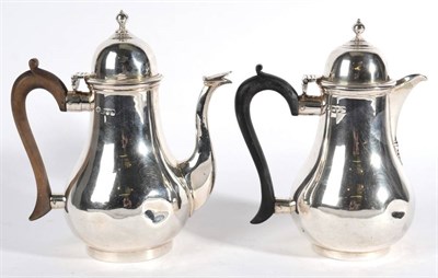 Lot 551 - A Pair of Edwardian Silver Cafe Au Lait Pots, Carrington & Co, London 1903/04, baluster form...