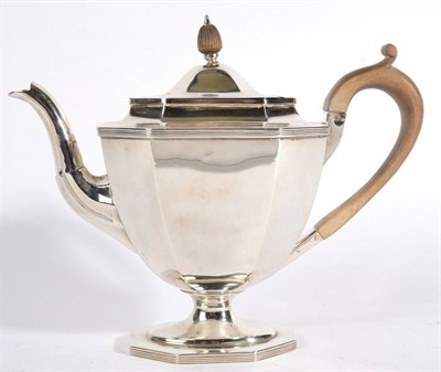 Lot 553 - A Silver Pedestal Teapot of George III Style, Thomas Bradbury & Sons, Sheffield 1908, octagonal...