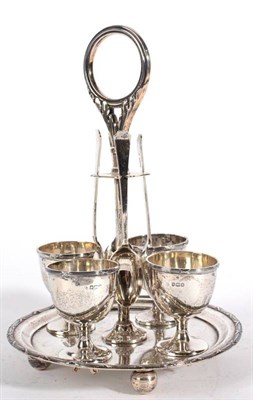 Lot 570 - A Silver Egg Cruet, William Hutton & Sons, Sheffield 1918, the associated spoons Sheffield...