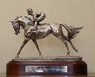 Lot 583 - A Filled Silver Model of a Horse and Jockey, maker's mark LRW, Sheffield 2005, on wood plinth...