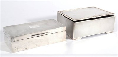 Lot 584 - Two Presentation Silver Table Cigarette Boxes, both Padgett & Braham, London 1926, both with engine